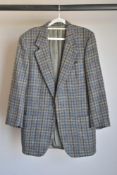 A vintage Val Di Taro Confezioni made in Italy jacket made in Pure New Irish Tweed, having charcoal,