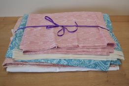 A collection of vintage fabrics. A length of pink moiree cotton, 72x64'. Two lengths of 'Sonata'