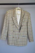 A 1970s Gucci double breasted tweed jacket, in soft wool: beige with blue, black and umber