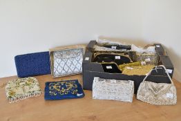 A quantity of vintage evening bags, a range of styles and fabrics, mostly brass frame and chain