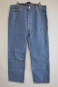 Two pairs of vintage Levis 501 jeans, red tab, indigo blue denim, size W42 L32. Levi Strauss & Co
