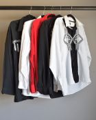 Five 1980s Versace shirts, including a 100% silk black andwhite example with embroidered dragons and