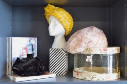 Three 1960s Christian Dior hats, one in black velvet bows and netting, two sheer polka-dot twist-