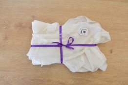 Two antique sets of mesh embroidered maid's uniform accessories, each including a half pinafore,