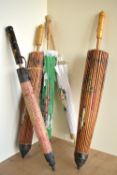 Five vintage and antique short-handled wooden parasols, three having exquisite Chinese / Japanese