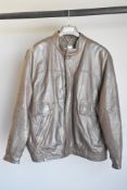 A vintage St. Michael jacket in brown leather, having bomber style collar, hip pockets, fully lined.