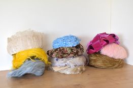 Ten 1950-60s ladies occasion hats, six of which are all-ver pastel coloured feather, two are velvet,