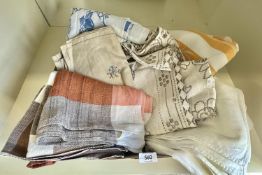 Six vintage tablecloths, including a hand embroidered furniture protector with floral motif with