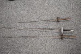 Vintage Leon Paul fencing foil, makers name PAUL visible beneath rust and tarnish, blade bent near