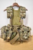 1980s British Army Discipline camouflage webbing backpack, consisting of eight pockets and