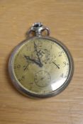 Gold-coloured faced pocket watch with German swastika contained in floral wreath, separate seconds