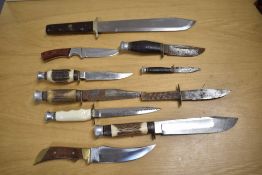 Collection of hunting and vintage cub-scout style sheath knives, mixture of handle types, various