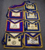 Masonic regalia, Cumberland & Westmorland Province, comprising seven aprons with badges and metal