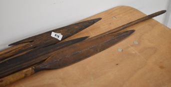 Traditional hunting spears and/or weapons, of tribal origin, possibly African, comprising two with