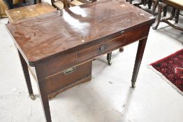 A 19th Century mahogany fold over tea table, width approx. 93cm