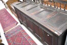 A period oak panelled kist, width approx. 168cm