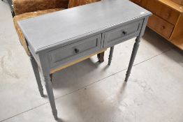 A modern grey laminate hall table , having two frieze drawers, width approx. 90cm