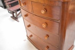 A Victorian mahogany bow fronted chest of two over three drawers, width approx. 105cm