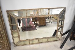 A period style wall mirror having gilt frame and tarnished surround, approx. 125 x 90cm