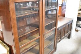 A Victorian mahogany bookcase top , on later castors, approx. height 165cm, width 125cm