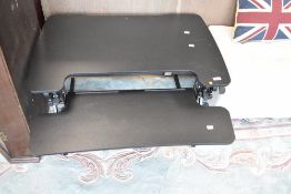 A flexispot folding work station