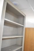 A modern laminated limed effect bookcase, height approx. 220cm, width 89cm