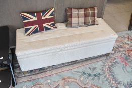A modern ottoman type bedding box, width approx. 130cm , sold with two scatter cushions