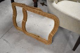 A pair of ropework wall mirrors, width approx. 51cm
