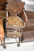 A Victorian folding high/low child's chair