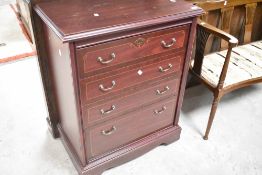 A set of mahogany effect laminate bedroom drawers
