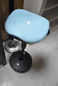 An ergonomic office/bar stool