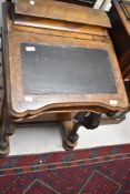 A Victorian walnut Davenport desk