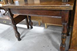 An early to mid 20th Century stained frame fold out dining table