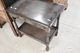 A priory style dark stained side table