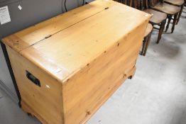 A 19th Century stripped pine bedding box having drawer base and bracket feet, dimensions approx. 105