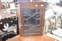 An Edwardian style miniature wall display cabinet having astral glazed door, height 54cm