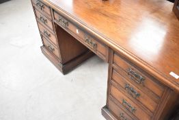 A Victorian Aesthetic style pedestal desk, width approx. 138cm