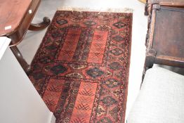 A Persian style rug, approx. 175 x 84cm