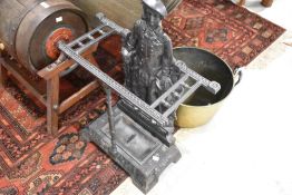 A traditional cast iron figural stick stand