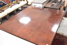 A 19th Century mahogany breakfast/dining table in the Gillows style having tilt top, with
