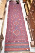 A Persian style carpet runner, approx. 268 x 62cm