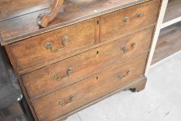 A 19th Century oak chest of two over two drawers, of nice proportions , having brass drop handles