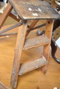 A vintage wooden step stool, labelled Pioneer
