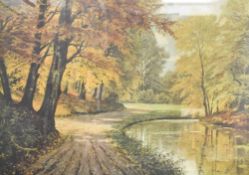 A 20th century colour print, autumnal park scene, indistinctly marked lower left, within a moulded