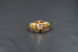 An 18ct gold diamond set gypsy style ring, the old cut diamond measuring approximately 0.50ct, in an