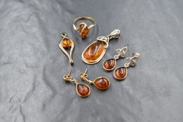 A selection of amber jewellery including a yellow metal suite stamped 375/Continental marks