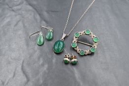 Four pieces of silver and chrysopase jewellery including a pendant, brooch and two pairs of