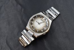 A Seiko Automatic wristwatch, the ombre grey dial having baton numerals and date aperture, on a