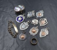 A group of nine silver presentation medallions, five having yellow metal applique decoration, one