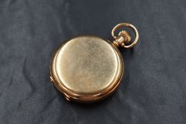 A Waltham U.S.A gold plated full hunter top wound pocket watch, the white dial having Roman numerals